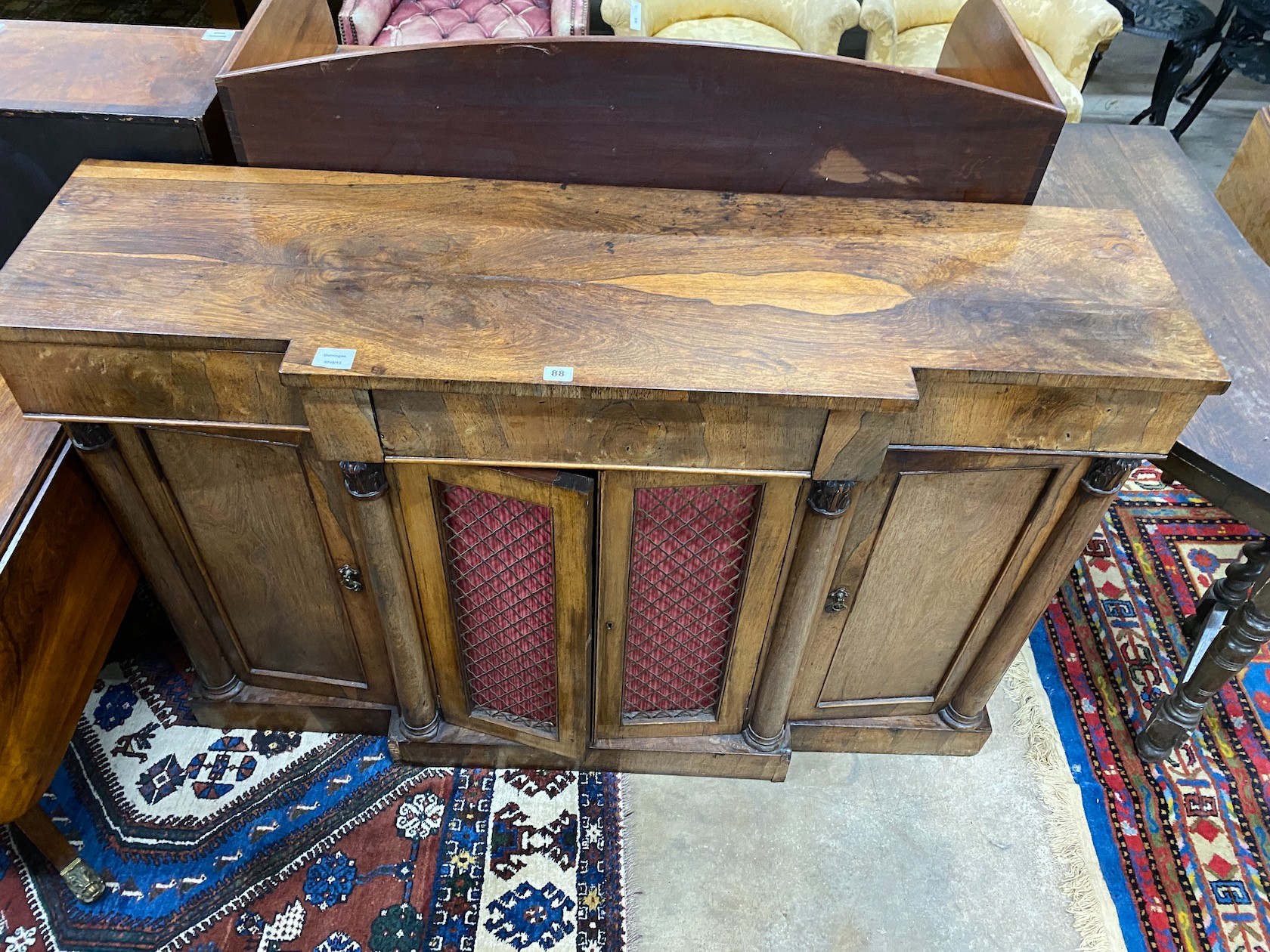 A Regency rosewood breakfront dwarf bookcase, width 140cm, depth 39cm, height 94cm